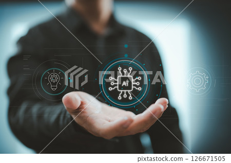 Businessman holding AI digital interface with smart chip, idea, and automation icons. Businessman holding AI digital interface with smart chip, idea, and automation icons. 126671505