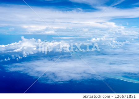 Aerial view of the Tuamotus atoll in French Polynesia with clouds 126671851