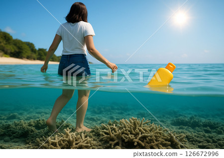 Sea conservation woman playing in ocean coral 126672996
