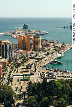Coastal cityscape with vibrant architecture and bustling port. Coastal cityscape with vibrant architecture and bustling port. 126673407