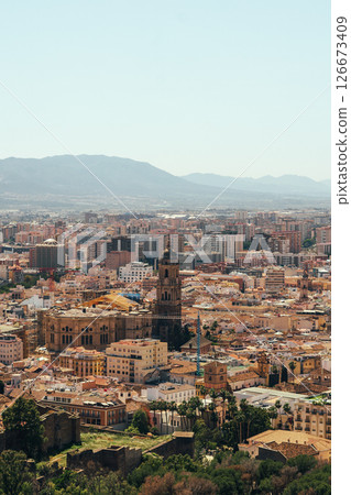 Scenic cityscape of historic architecture and urban sprawl. Scenic cityscape of historic architecture and urban sprawl. 126673409