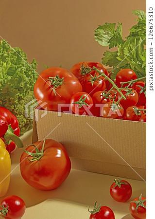 Close-up of tomatoes spilling from a rustic box, highlighting their glossy skins and vivid red tones on a neutral brown backdrop. Healthy food background Close-up of tomatoes spilling from a rustic box, highlighting their glossy skins and vivid red tones on a neutral brown backdrop. Healthy food background 126675310