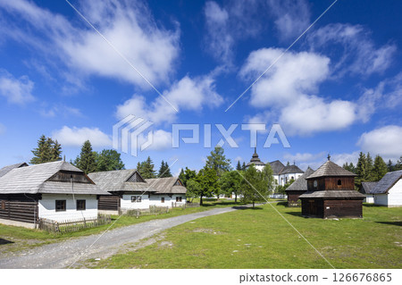 Museum of Liptov Village in Pribylina showcasing traditional Slovak architecture under blue sky 126676865
