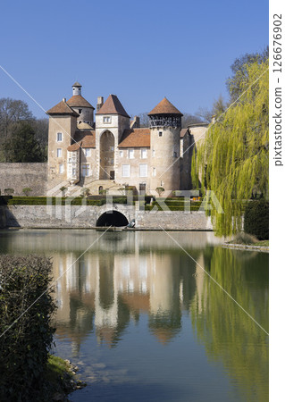 Chateau de Sercy reflecting in the moat in Saone et Loire, Bourgogne Franche Comte, France Chateau de Sercy reflecting in the moat in Saone et Loire, Bourgogne Franche Comte, France 126676902