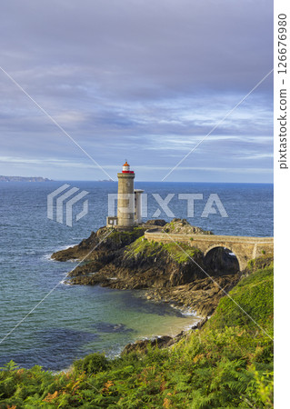 Fort du Minou lighthouse standing on rocky coast of Brittany in France 126676980