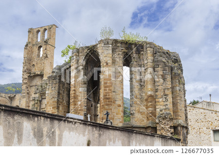 Ruins of the Benedictine Abbey of Saint Andre in Alet les Bains, France, showing its octagonal dome and bell tower Ruins of the Benedictine Abbey of Saint Andre in Alet les Bains, France, showing its octagonal dome and bell tower 126677035