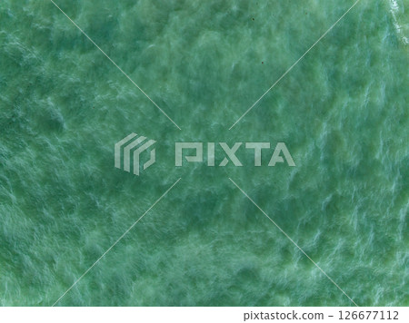 Top view sea surface nature background,Wide angle view ocean waves background. 126677112