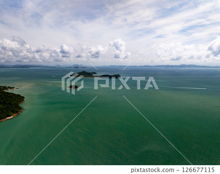 Aerial view landscape sea beach in raining season at Phuket island Thailand. 126677115