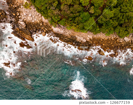 Aerial view landscape sea beach in raining season at Phuket island Thailand. Aerial view landscape sea beach in raining season at Phuket island Thailand. 126677159
