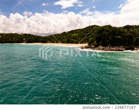 Aerial view landscape sea beach in raining season at Phuket island Thailand. Aerial view landscape sea beach in raining season at Phuket island Thailand. 126677187