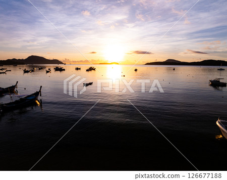 Aerial view sunset sky,Nature beautiful light Sunset or sunrise over sea,Colorful scenery sunset sky background,Amazing clouds and waves in sunrise sky nature light cloud background. 126677188