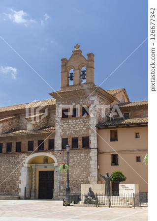 Church of San Pedro showing its bell tower and the monument to Bishop Polanco in Teruel, Spain 126677342