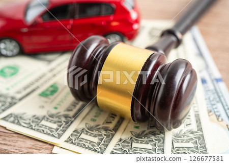 Hammer gavel judge and Euro banknote money with car vehicle accident, insurance coverage claim lawsuit court case. Hammer gavel judge and Euro banknote money with car vehicle accident, insurance coverage claim lawsuit court case. 126677581