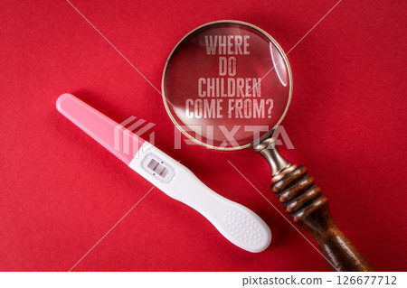 Where do children come from. Pregnancy Test and Magnifying Glass 126677712