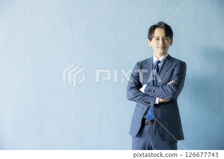 Men in suits crossing arms 126677743