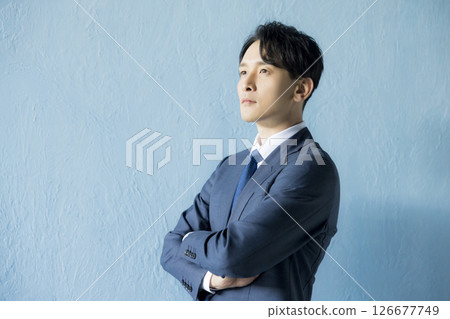 Men in suits crossing arms 126677749