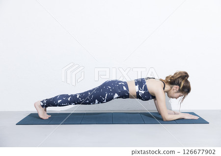 Woman doing muscle training 126677902