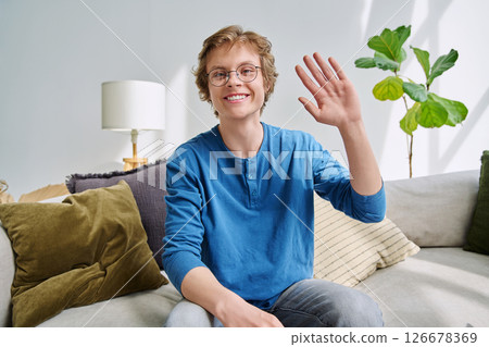 Webcam portrait male student teenager with glasses, sitting at home Webcam portrait male student teenager with glasses, sitting at home 126678369
