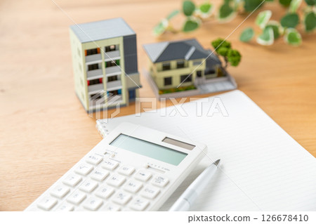 House model, calculator and notebook House model, calculator and notebook 126678410