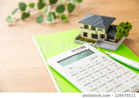 House model, calculator and notebook House model, calculator and notebook 126678521