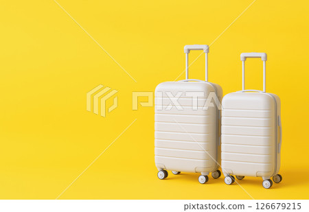 Two modern white suitcases with wheels and handles on bright yellow background, concept of travel, vacation, luggage, trip planning, holiday preparation Two modern white suitcases with wheels and handles on bright yellow background, concept of travel, vacation, luggage, trip planning, holiday preparation 126679215