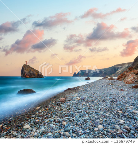 Amazing view of the beach and rocks shot with a long exposure. 126679749