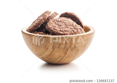 Sweet oatmeal cookies in bowl isolated on white background. Sweet oatmeal cookies in bowl isolated on white background. 126681137