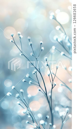Pastel colored floral background featuring delicate white flowers blooming on thin branches, creating a dreamy and ethereal atmosphere with a soft bokeh effect 126681658
