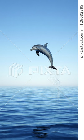 Dolphin leaping joyfully from the tranquil blue water, with a bright clear sky in the background, evoking feelings of freedom and happiness in a serene natural setting Dolphin leaping joyfully from the tranquil blue water, with a bright clear sky in the background, evoking feelings of freedom and happiness in a serene natural setting 126682895