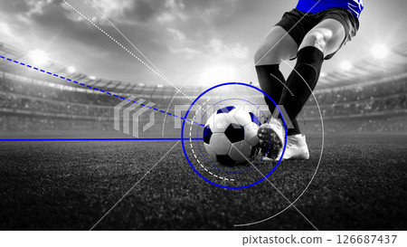 Close-up of powerful ball control move during football match with digital visual effects tracking rotation and speed. Contemporary art design 126687437