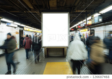 Busy Subway Entrance with Commuters in Motion Busy Subway Entrance with Commuters in Motion 126687468