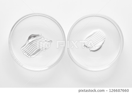 A sample of cosmetic moisturizing or anti-aging cream in a petri dish. A sample of cosmetic moisturizing or anti-aging cream in a petri dish. 126687660