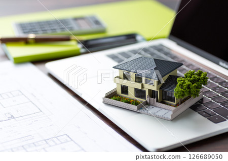 House plans, calculator and computer 126689050