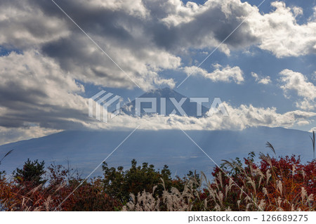 Mount Fuji partially hidden by clouds viewed from Komitake Shrine in Japan 126689275