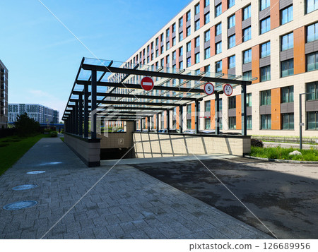 Exploring Modern Urban Architecture Featuring a Garage Entrance in Todays Contemporary World Exploring Modern Urban Architecture Featuring a Garage Entrance in Todays Contemporary World 126689956