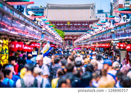 Tokyo cityscape in Japan: Sensoji Temple crowded with tour groups and foreign tourists on the 28th Tokyo cityscape in Japan: Sensoji Temple crowded with tour groups and foreign tourists on the 28th 126690357