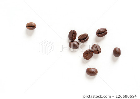 Coffee bean. Brown roasted coffee beans seeds isolated. Coffee bean on white background. Close up image. 126690654