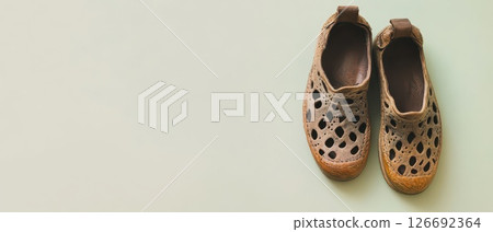 Lightweight stylish shoes on a light surface 126692364