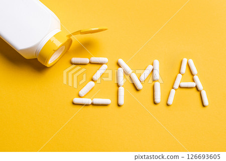 ZMA supplement capsules and bottle 126693605