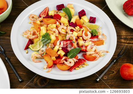 Fresh shrimp salad with colorful fruits. Fresh shrimp salad with colorful fruits. 126693803