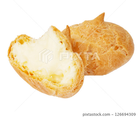 Homemade profiteroles with cream on a white background 126694309