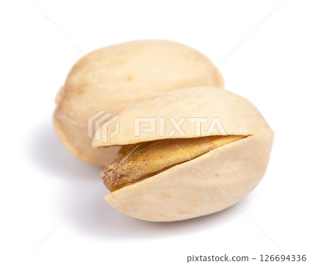Tasty pistachio nuts on white background Tasty pistachio nuts on white background 126694336