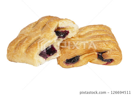 Puff pastry with jam isolated on white background. Close-up 126694511