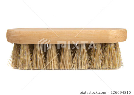 wooden scrubbing brush isolated over white background 126694810