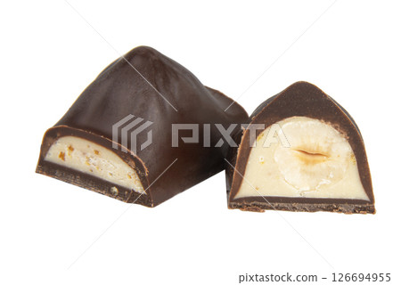 Chocolate sweet candy with nut glazed in half isolated on the white background 126694955