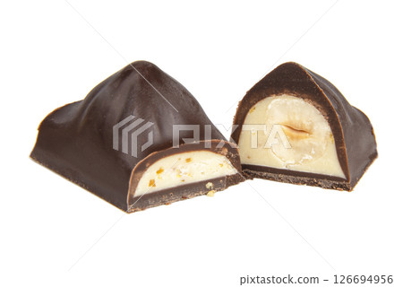Chocolate sweet candy with nut glazed in half isolated on the white background 126694956