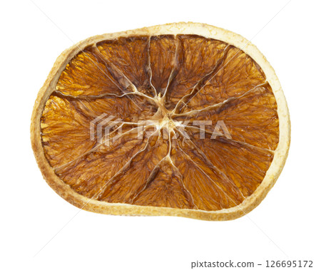 Dried orange isolated on a white background. Dried orange slice macro 126695172