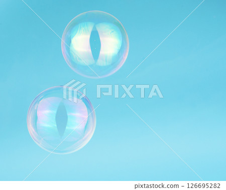Soap bubbles on blue background blured selective Soap bubbles on blue background blured selective 126695282