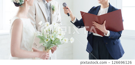 Wedding reception host and bride and groom Wedding reception host and bride and groom 126696126