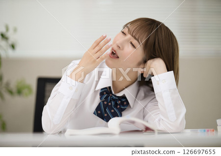 School girl who is studying 126697655